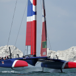 The Great Britain SailGP Team sailing past The Needles, ahead of Cowes SailGP