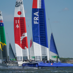 Australia SailGP Team, Japan SailGP Team and France SailGP Team cross the start line in race 1.
